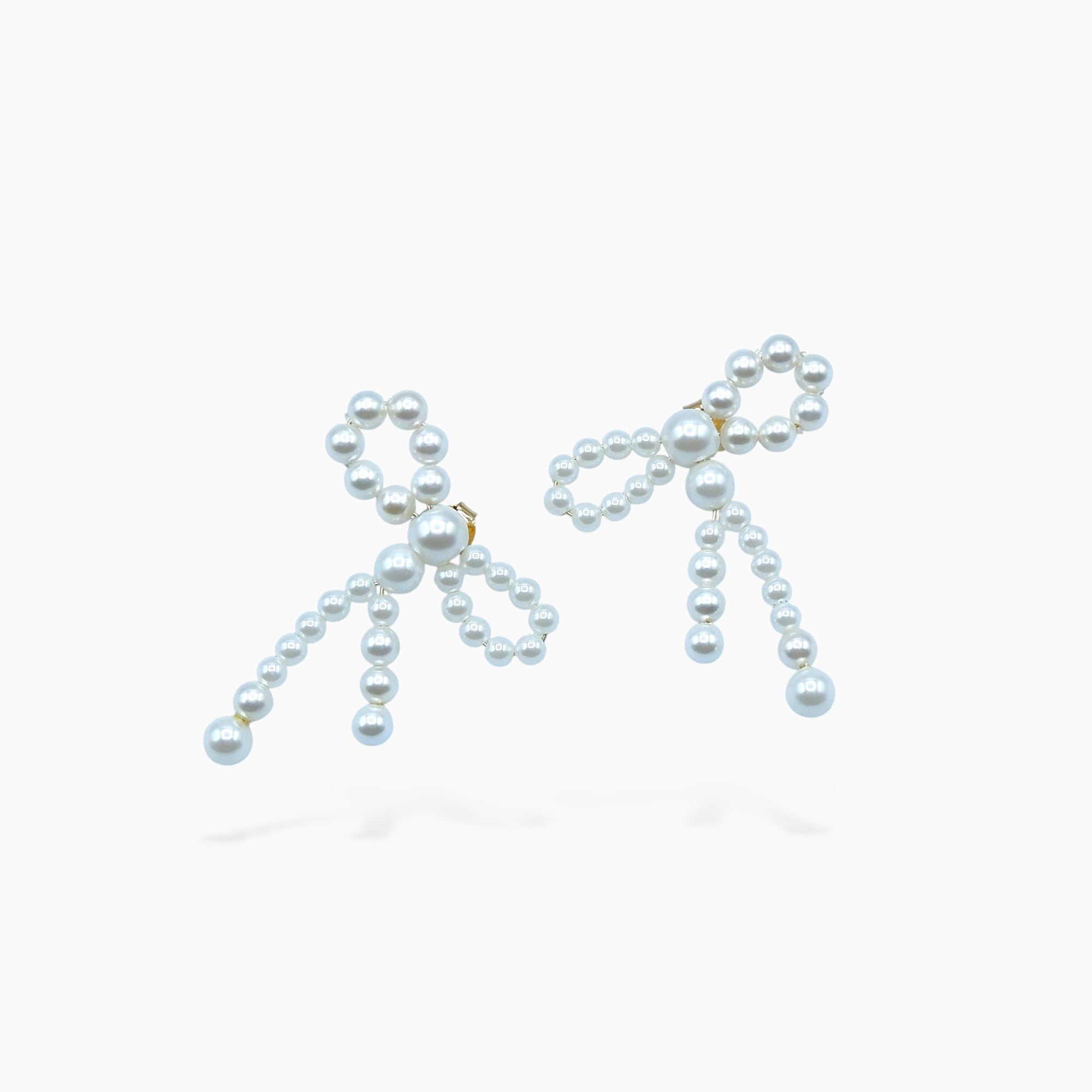 Orecchini fiocco perle